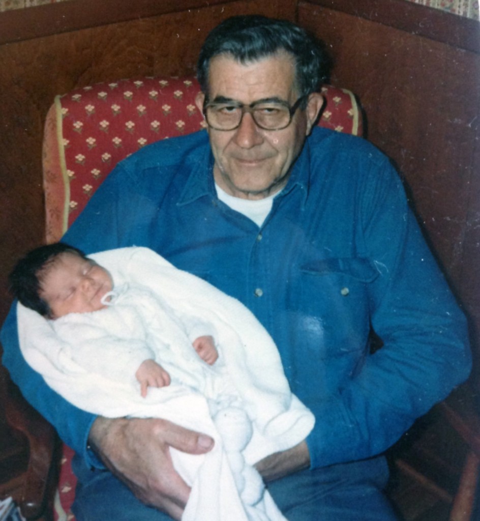 Grandpa holding Ellynne, my daughter, about 21 years ago